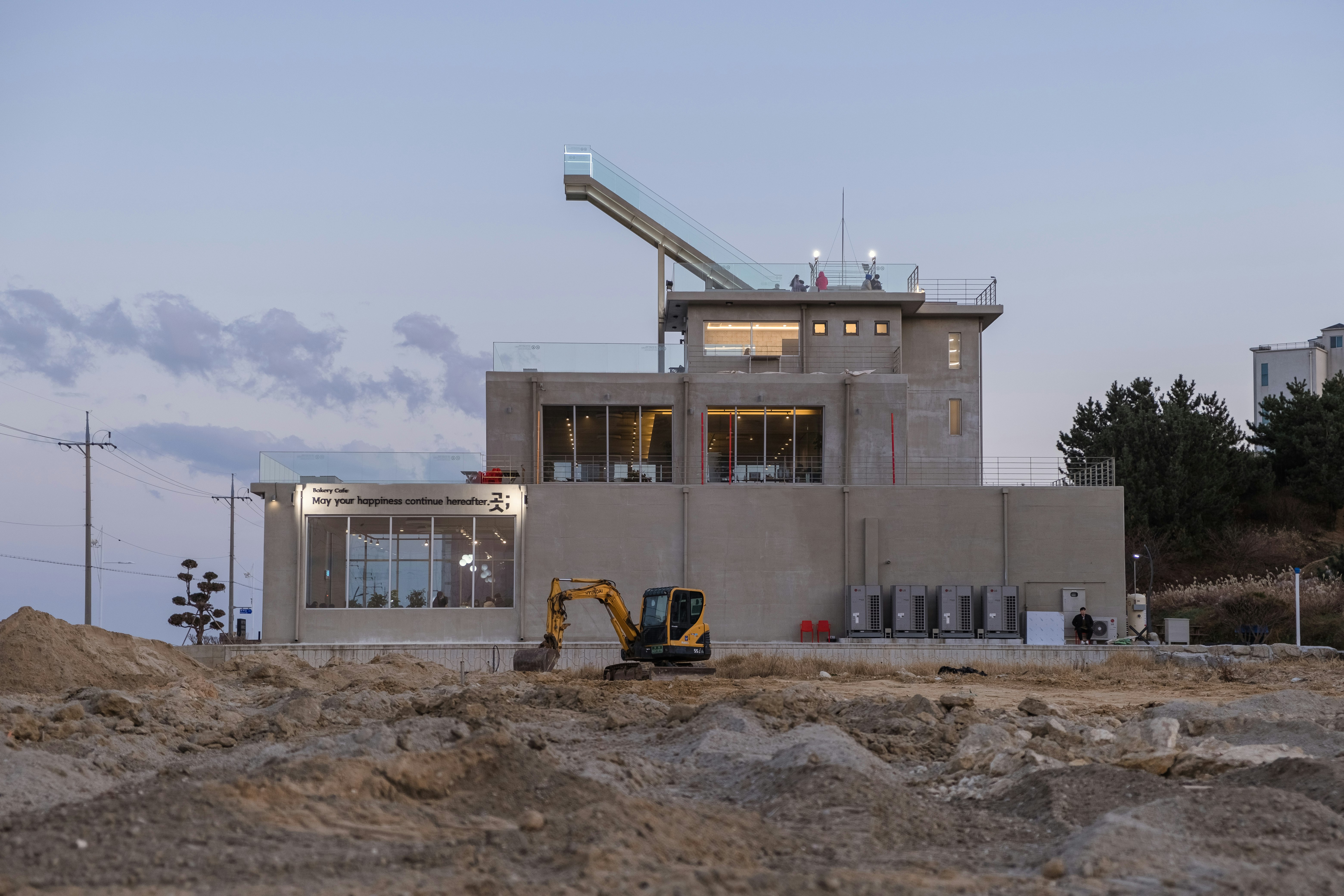 white concrete building under blue sky during daytime